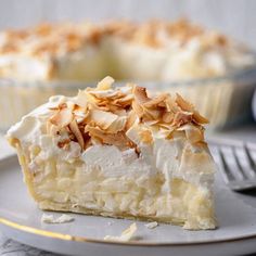 a piece of pie sitting on top of a white plate