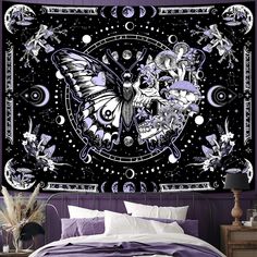 a bed room with a large tapestry on the wall and a night sky above it