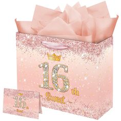 a pink gift bag with the number 16 on it