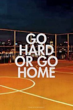 the words go hard or go home are displayed on an outdoor basketball court