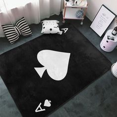 a black rug with white symbols on it