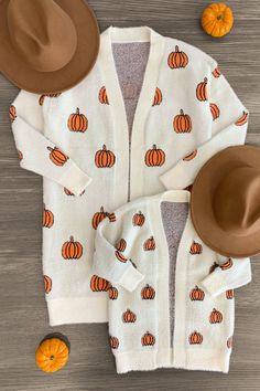 You and your little girl will be so cute matching in these adorable Cozy Cream Pumpkin Cardigans. This open-front cardigan is crafted from a cozy knit material and comes in adult and child sizes. Shop this cardigan today! Mommy And Me Heart Sweaters, Pumpkin Cardigan, Thanksgiving Mom, Mommy Outfits, Sweet Cream