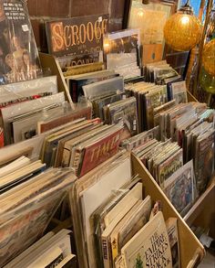 there are many records on display in the store, and it is hard to find