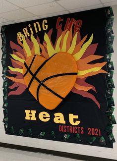 a sign with a basketball on it that says bring the heat