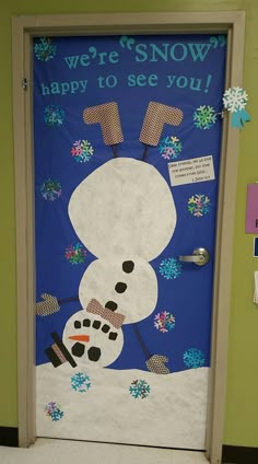 a door decorated to look like a snowman