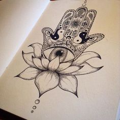 a drawing of a hand holding a lotus flower