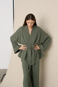 🌿 DETAILS 🌿 ✳ Wide sleeves ✳ Removable Belt ✳ Oversized ✳ Kimono style ✳ Suitable for both males and females - unisex 🌿 DESCRIPTION 🌿 Designed in kimono style, this piece is perfect for those who seek comfort and style in their everyday wear.  The soft and breathable muslin cotton fabric drapes effortlessly over the body, providing an airy and relaxed feel, allowing you to move freely without any restrictions. The kimono-style silhouette gives this piece a timeless appeal, making it perfect Oversized Cotton Kimono For Daywear, Cotton Sleepwear With Kimono Sleeves For Home, Relaxed Fit Kimono For Sleep, Oversized Cover-up With Kimono Sleeves For Loungewear, Relaxed Fit V-neck Kimono For Loungewear, Cotton Gauze Fabric, Double Gaze, Gauze Fabric, Khaki Color