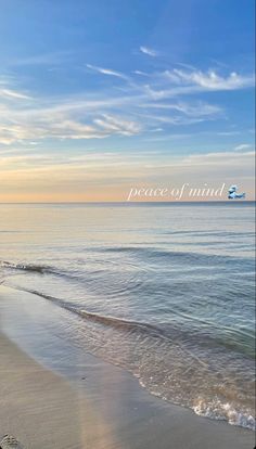 there is a beach with waves coming in to shore and the words peace of mind above it