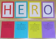 the word hero written in cut out letters on top of colored paper with words below it