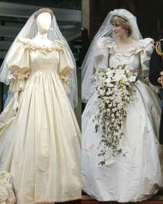 two wedding gowns on display in front of a window