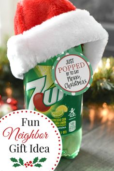 a green bottle with a red santa hat on it and the words fun neighbor gift idea