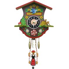 a colorful cuckoo clock hanging from the side of a building with figures on it's sides