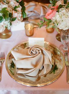 an image of a table setting with flowers and place settings on the menus page