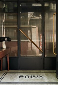 the entrance to an office building with glass doors