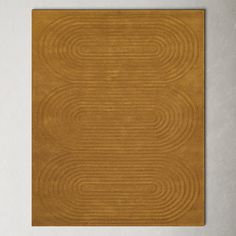 a brown rug with wavy lines on it