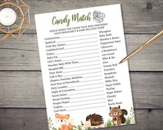 a candy match game with woodland animals on it and a pen next to the paper