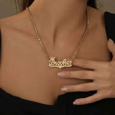 Make a statement with our new double plated collection! Personalize this figaro chain with your name, the name of a loved one, or a special word. Crafted from 18K gold and silver plating, this piece is made to last. Details: Personalize With: Names, Numbers, or Words. Pendant Size varies by name (3.5cm-5cm) Matching Figaro Chain Closure: Lobster Clasp Name Chain Gold Design, Name Chain Gold, Name Necklace Aesthetic, Name Chains, Name Chain, Teeth Jewelry, Pretty Accessories, Gold Name Necklace, Figaro Chains