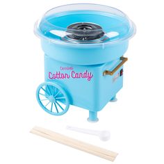 Bring a festive mood to any party by turning candy floss or hard candy into fluffy clouds of everyone’s favorite carnival treat with the Cotton Candy Machine for Kids by Great Northern Popcorn. The clear rim guard allows you to see the cotton candy being made while helping to prevent messes, and the suction cup feet help keep the candy machine securely in place on your counter or tabletop. This candy making kit is a great birthday gift or housewarming present for anyone who loves fun specialty kitchen appliances. Great Northern Popcorn Blue Countertop Cotton Candy Machine (450-Watt) | 83-DT6085 Cotton Candy Machines, Colored Popcorn, Paper Cones, Fluffy Clouds, Blue Candy, Candy Floss, Candy Making, Party Treats, Great Birthday Gifts