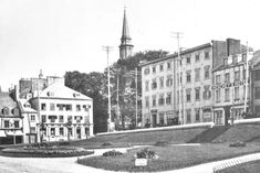 an old black and white photo of some buildings