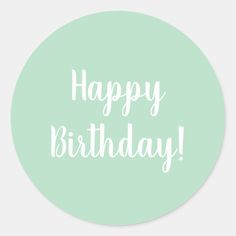 a round sticker with the words happy birthday in white on a mint green background