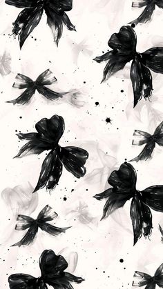 black and white painting with lots of bows on it's back drop down to the ground