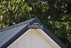 the roof of a building with a sign that says supervisor buildings on it's side