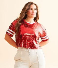 DH Apparel Varsity Sequin Cropped Top - Red Small, Women's Crimsonred All-over sequin knit lined top Striped sleeve hits Bust measures 41 on size small Body length 18 3/4 on size small. Layering piece(s) and/or accessories sold separately.. 100% Polyester. Spot clean only. Do not bleach. Flat dry. Low iron on reverse. Do not dry clean. Apparel & Accessories > Clothing > Shirts & Tops Glamorous Fall Top With Contrast Sequin, Glamorous Contrast Sequin Top For Fall, Glamorous Fall Tops With Contrast Sequin, Short Sleeve Top With Sequins For Fall, Short Sleeve Tops With Sequins For Fall, Short Sleeve Sequined Tops For Fall, Fall Short Sleeve Top With Sequins, Red Sequin Tops For Spring, Casual Winter Tops With Sequins