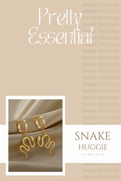 The perfect pair of gold edgy huggie earrings! These gold snake drop huggie earrings are perfect for everyday wear. Pair these earrings with additional gold piercings or by itself, either way it’s a look! Pair these with deep colored monochrome outfits to make the gold pop! Gold Piercings, Snake Earrings, Gold Statement Earrings, Gold Earrings Designs, Gold Snake, Huggie Earrings, Gold Hoops, Huggies Earrings, Gold Earrings Studs