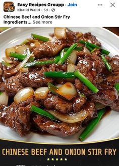 a plate with beef and onion stir fry on it's own twitter post for chinese beef and onion stir fry