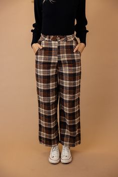 These pants feature a classic plaid pattern with a high-rise waist for a flattering fit. The four-pocket design adds functionality to fashion, and the fleece exterior ensures warmth and coziness. Elevate your winter wardrobe with these versatile and chic plaid pants. zip-fly with button closure function pockets unlined // paired with the Beverly balloon sleeve sweater in black + the vintage goods foam trucker hat *FINAL SALE* Balloon Sleeve Sweater, Saddle Brown, Plus Size Shopping, Plaid Pants, Blankets For Sale, Sweater Sleeves, Winter Wardrobe, Plaid Pattern, Trinidad And Tobago