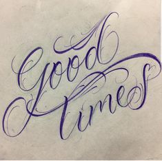 the word good times written in cursive writing on a piece of white paper