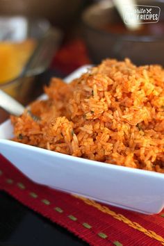 mexican rice in a white bowl with the words restaurant mexican rice