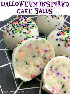 halloween inspired cake balls on a plate with sprinkles