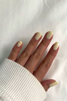 Capture the essence of sunny days with our radiant summer yellow nails! Flash a smile on your hands with a color that's as warm and inviting as a sunny afternoon. Nail Ideas Yellow, Pale Yellow Nails, Light Yellow Nails, French Tip Nails White, Nail Trends Spring, Spring Nail Color, Sky Blue Nails, Soft Pink Nails