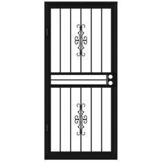 a black iron door with an ornamental design on the top and bottom bars, in front of a white background