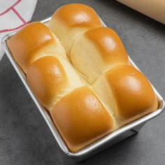 a loaf of bread sitting on top of a pan