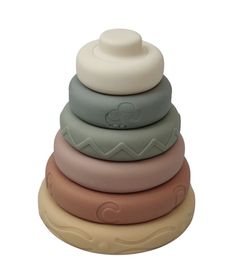 a stack of different colored toys sitting on top of each other