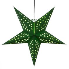 an origami star hanging from a string on a white background with green stars