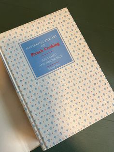 a cookbook sitting on top of a table