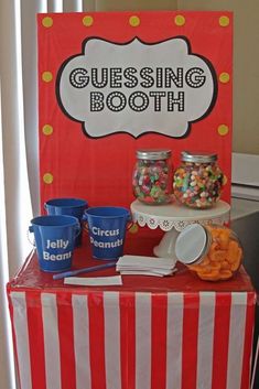 a table with candy and candies on it for a circus themed birthday or baby shower