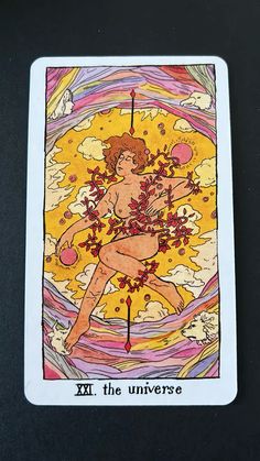 a tarot card with an image of a woman holding flowers in her hand and the words xxii, the universe