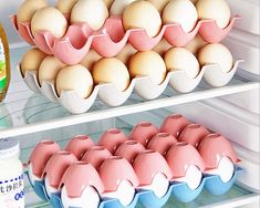 eggs and milk are on shelves in the refrigerator