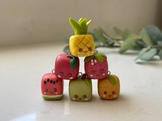 a group of small fruits sitting on top of each other