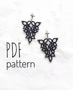 a pair of black lace earrings on top of a white sheet with the words pdf pattern