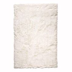 a white rug on a white background