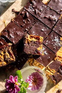 chocolate bars and flowers on a table