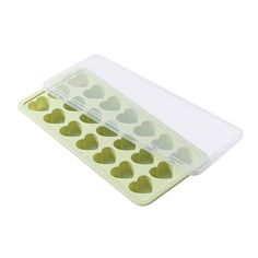 heart shaped ice cubes in a plastic container on a white background with the lid open