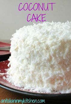 a close up of a cake on a plate with the words how to make a coconut coconut cake