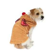 a small dog dressed up in a towel and wearing a sweater with a bow on it's collar