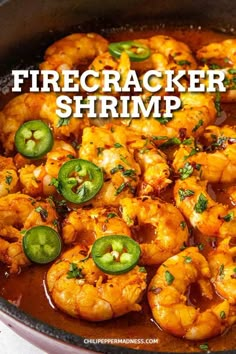 a skillet filled with shrimp and jalapenos